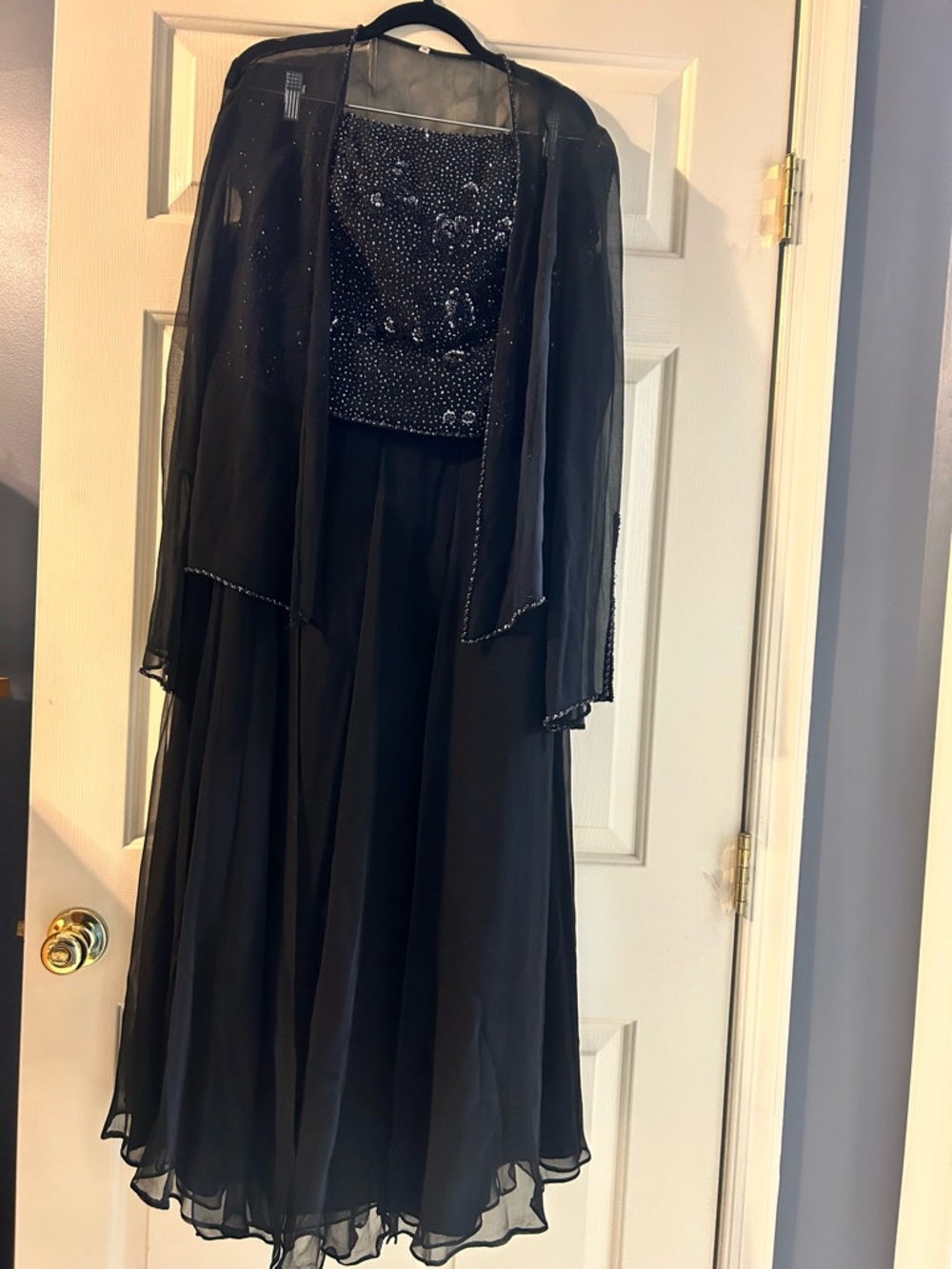 Elegant black mother of the bride or groom dress. Black size 14 petite length.